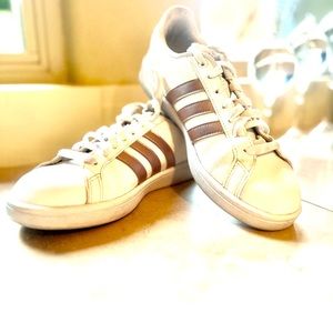 Adidas Cloudfoam                   White leather with soft pink stripes.